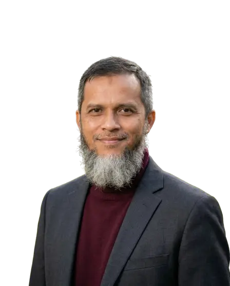 Pria berjanggut dengan jas formal.